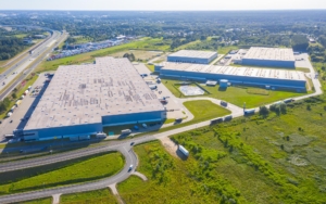 Overhead view of a large industrial building during the day