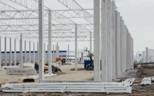 View of a large structure being built at work site