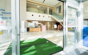 Ground view of open sliding doors at hospital